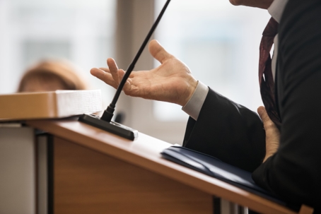 Lawyer on the stand.